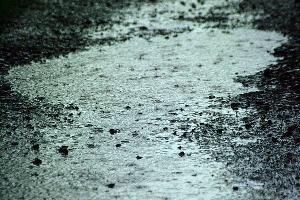 Diffuse overland flow (sheetflow). Note the impacts of raindrops